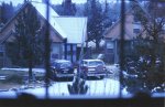 View of the neighbor's unit across the street, covered in snow